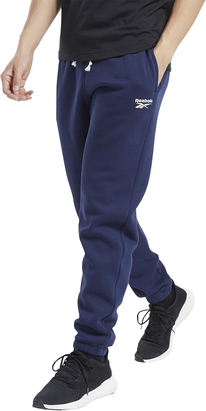 Reebok - Pantaloni da allenamento in pile da uomo, Uomo, Pantalone,  Training Essentials Fleece Pants, Vector Navy, Large : Amazon.it:  Abbigliamento