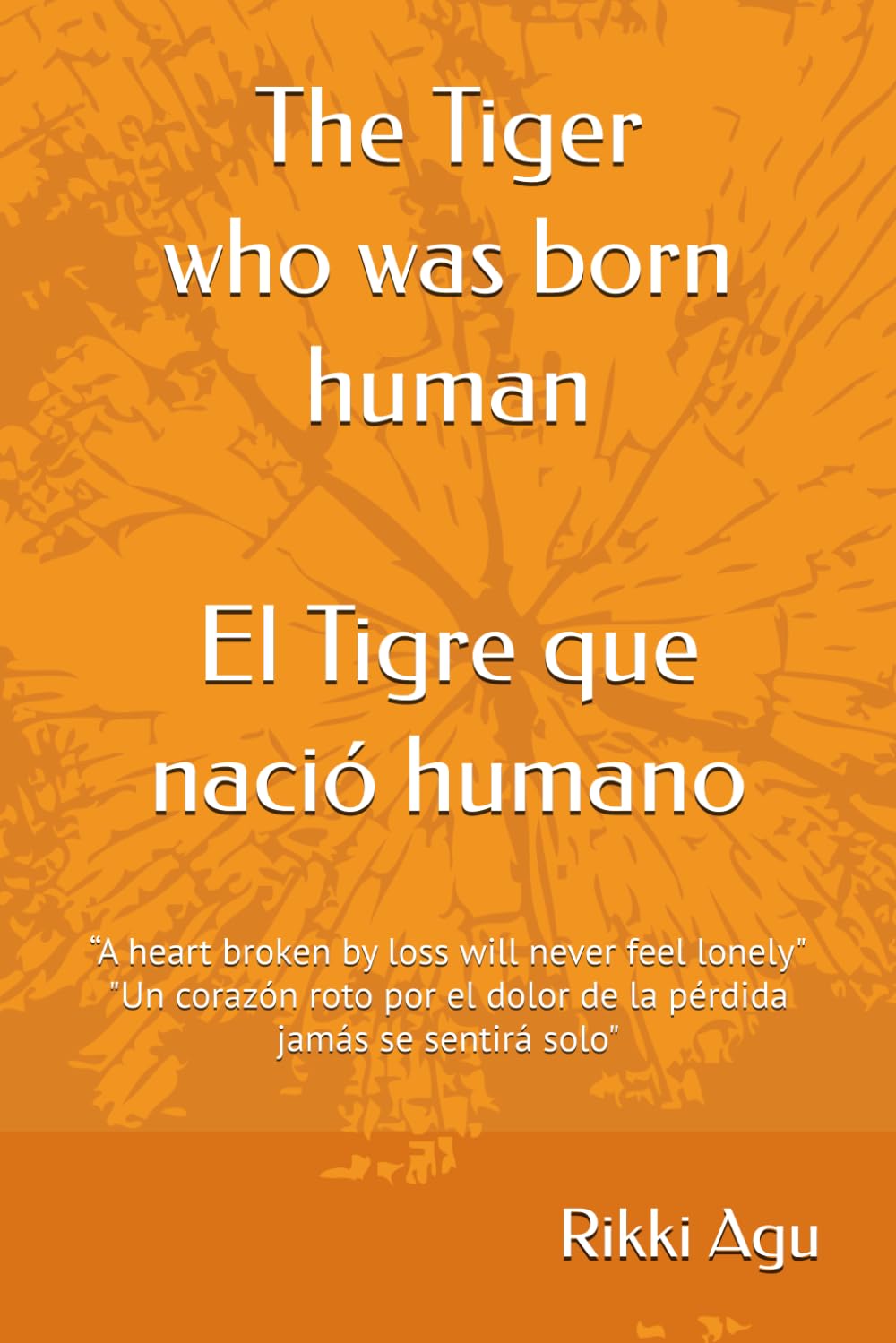 The Tiger Who Was Born Human: “A heart broken by loss will never feel lonely". "Un corazón roto por el dolor de la pérdida jamás se sentirá solo". Two language book (English - Español)