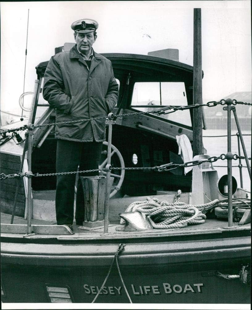 Vintage photo of Coxswain Jack Bryan of Gorleston lifeboat, back on board the ex-Selsey, Sussex, lifeboat Canadian Pacific, when she arrived at Gorleston yesterday.