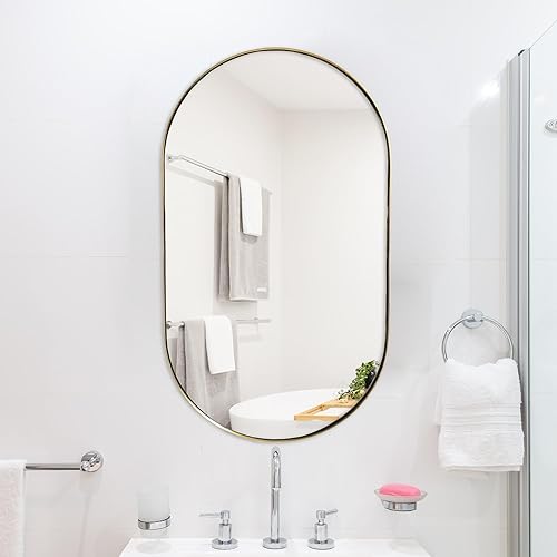 Miniatura 2 de TUSIWIT Espejo de pared ovalado dorado con forma de píldora, espejo de baño con marco de acero inoxidable, espejo de pared decorativo montado