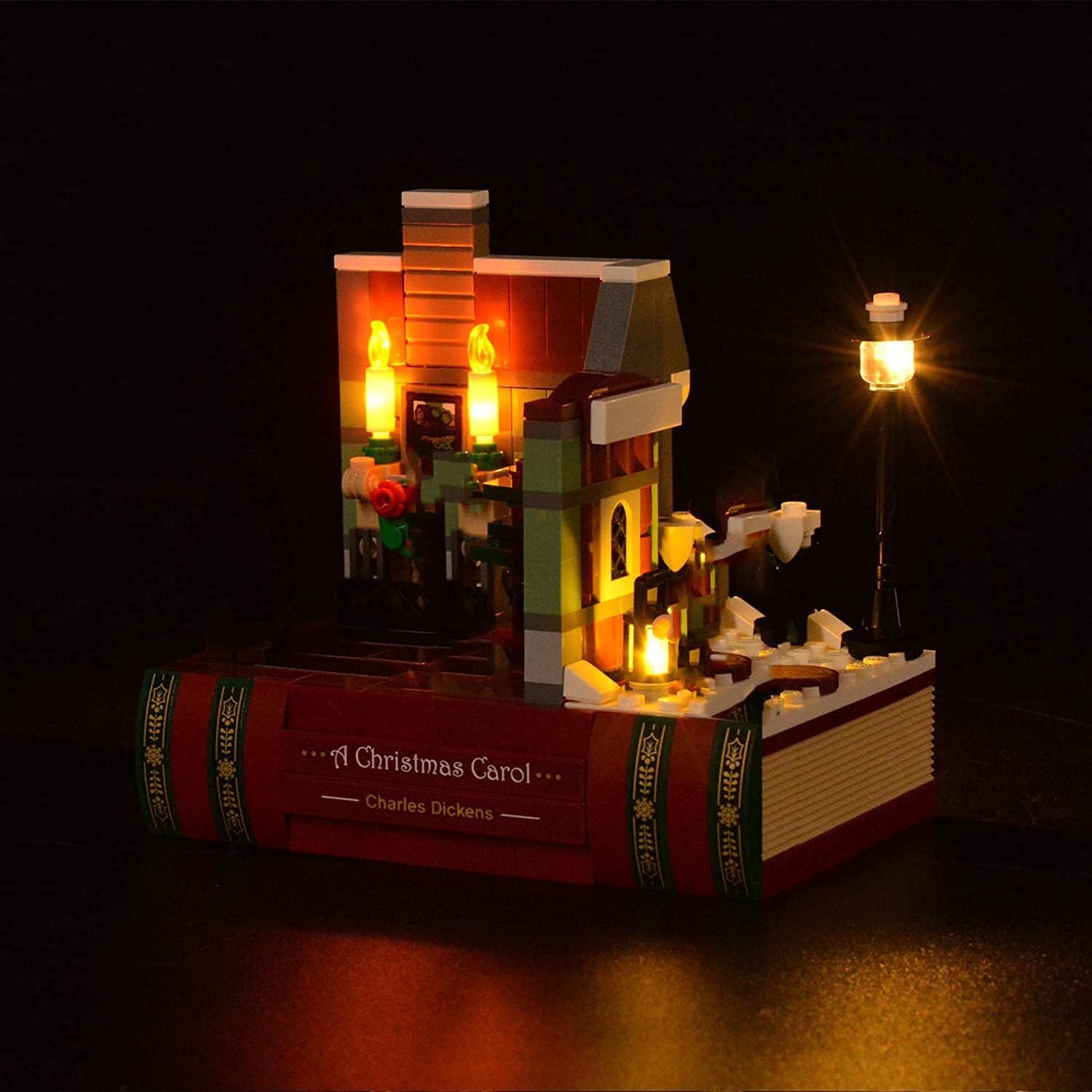 Close-up view of the T-Club LED Light Kit installed on the LEGO Charles Dickens Tribute 40410, highlighting the illuminated interior and exterior details.