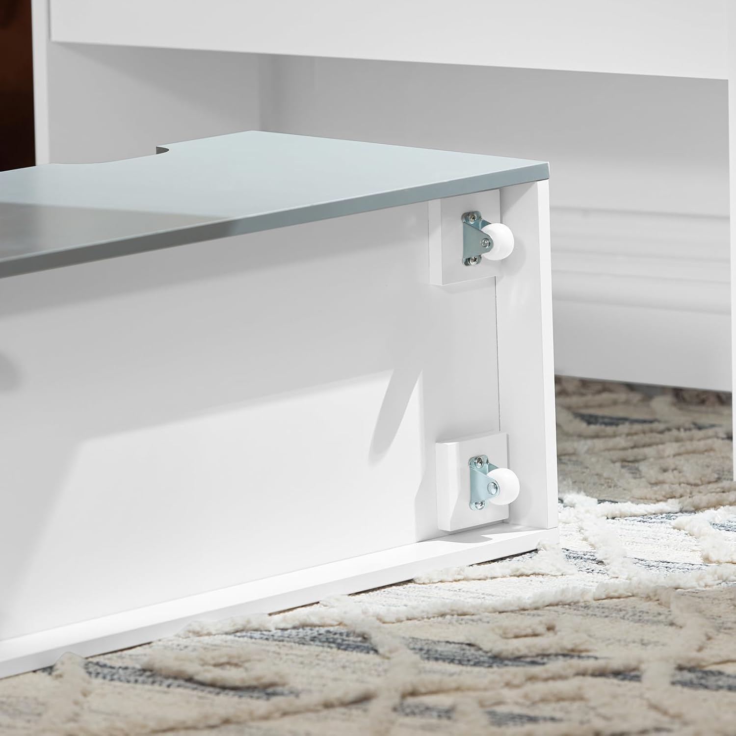 Close-up of the wheels on the removable storage drawer