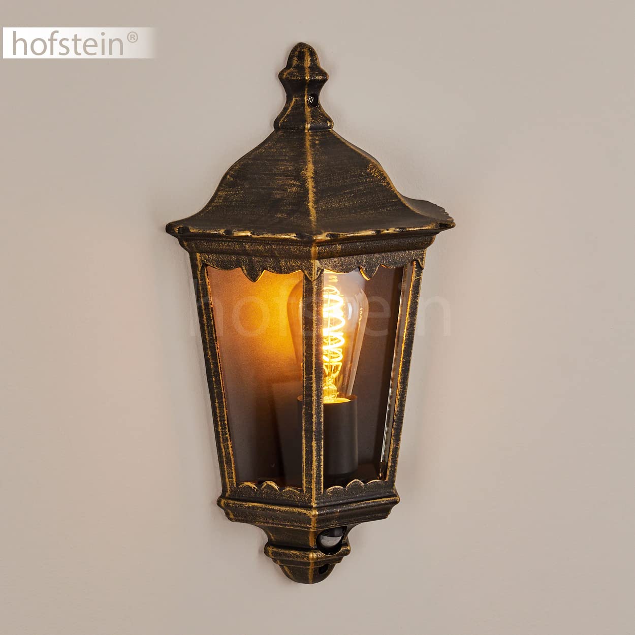 HOFSTEIN Außenwandleuchte Hongkong, Außenwandlampe mit Bewegungsmelder aus Metall/Glas in Braun-Gold/Klar, Wandleuchte Up im Retro/Vintage-Design, E27, IP44, Eingangsbereich, Terrasse, Haustür, Hof