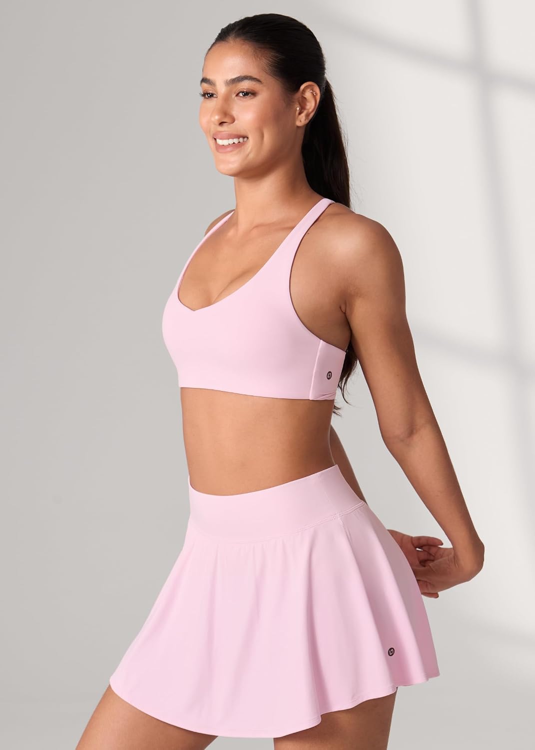 UNISSU Hugcurve Adjustable Twist Cross Back Sports Bra for Women V Neck Wireless Padded Yoga Workout Tops