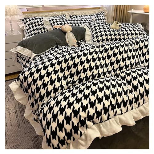 Linge de lit chaud en velours noir contre le froid hivernal avec ruffes