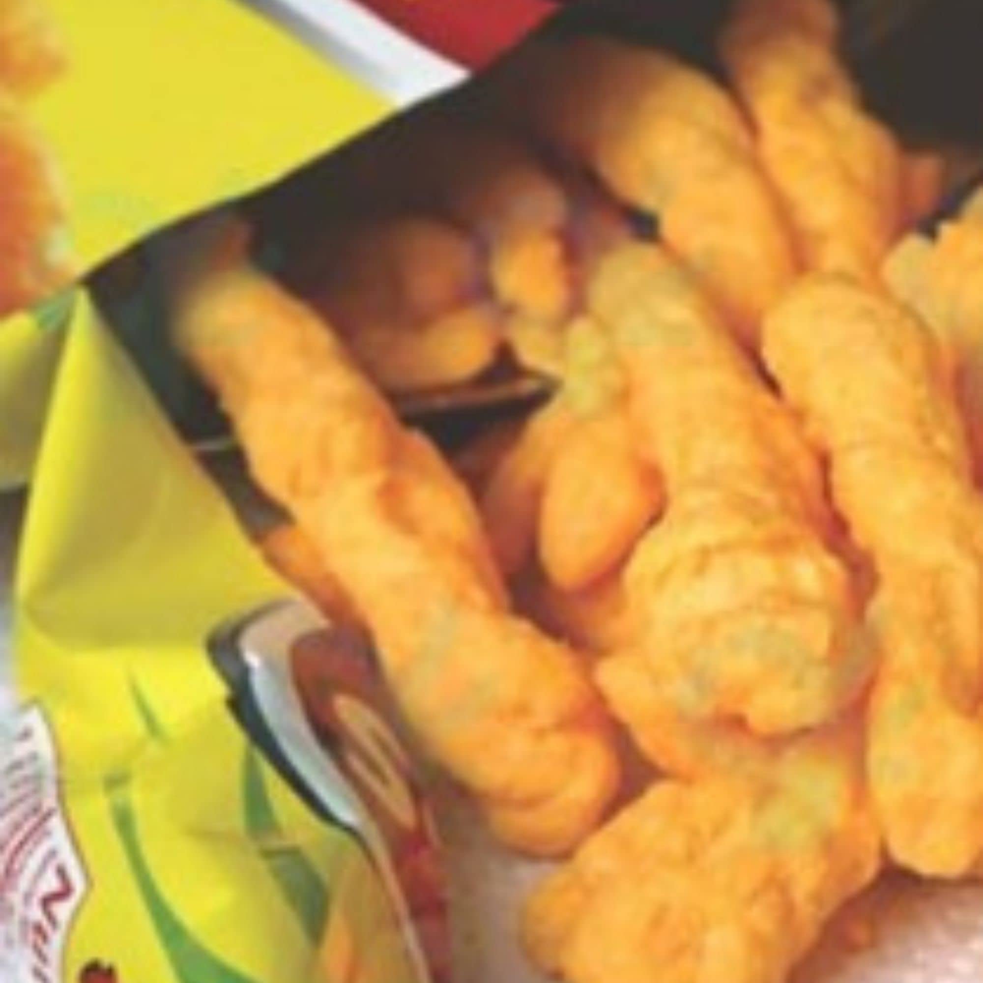 Twisties Cheeky Cheddar Cheese 60 g chacun 14 paquets, Halal, Exp 12 août 2026