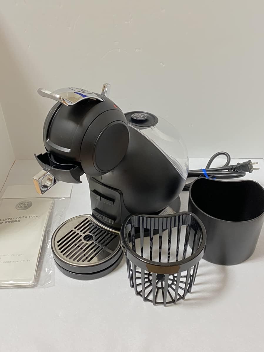 NESCAFE DOLCE GUSTO MD9748-MB removable parts: capsule holder, cup holder, and water tank