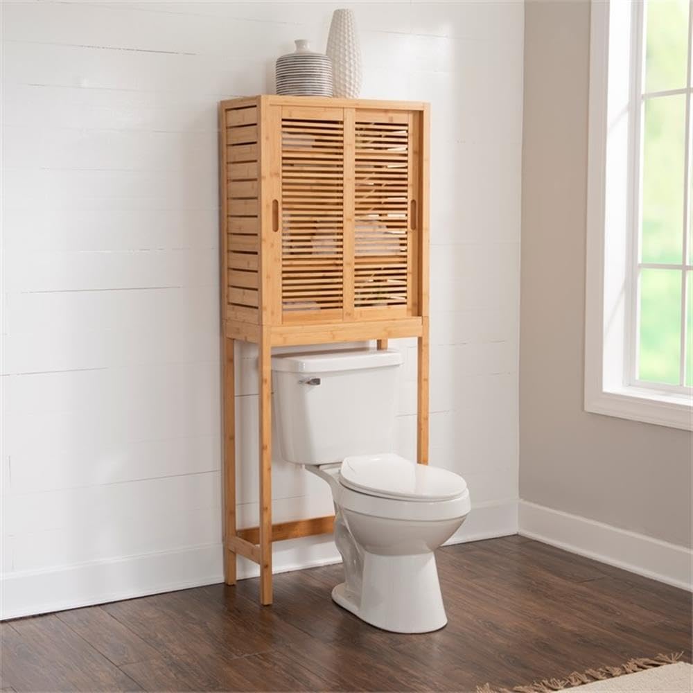 Linon Bracken Bamboo Spacesaver installed over a toilet with items on shelves