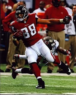 Posterazzi Tony Gonzalez Running With Football Photo Print (16 x 20) - Item # MVM01003