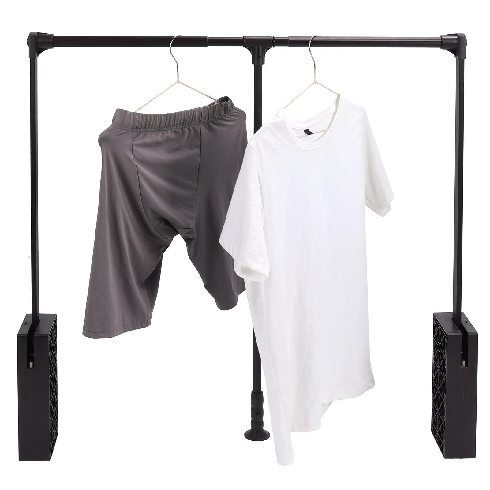 Tringle de penderie rabattable pour aménager un dressing haut et moderne dans la chambre