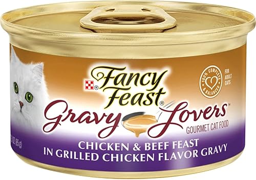 Miniatura 1 de Fancy Feast Gourmet - Comida húmeda para gatos con salsa, 12 latas (fiesta de pollo y ternera)