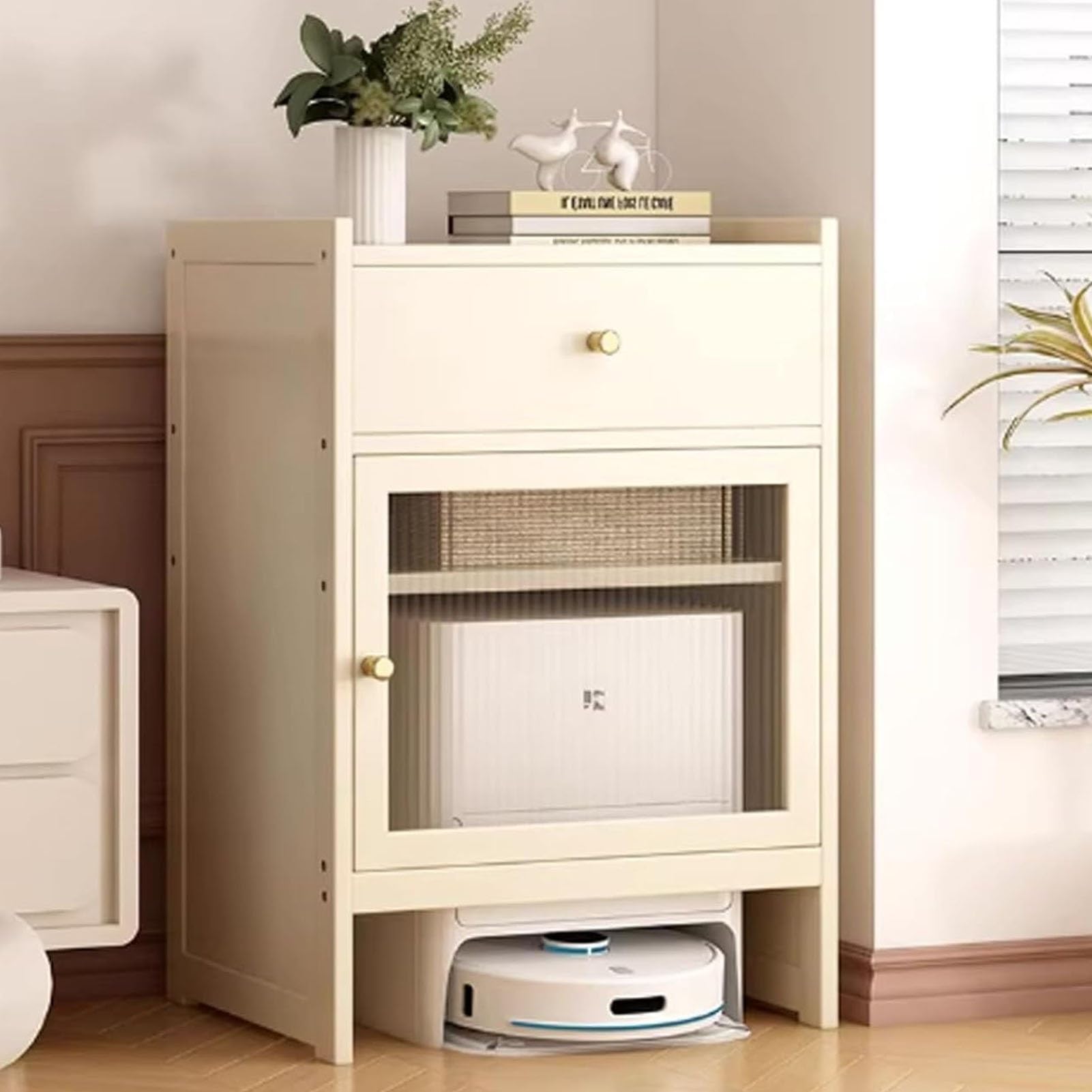 Meuble de rangement pour aspirateur robot qui cache la station de charge