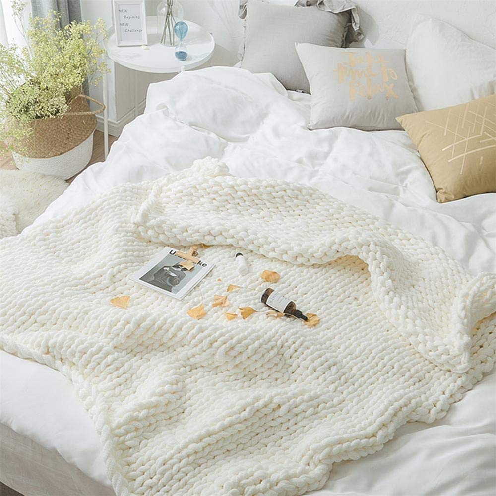 Couverture tricot épais pour vos moments cocooning sur le canapé