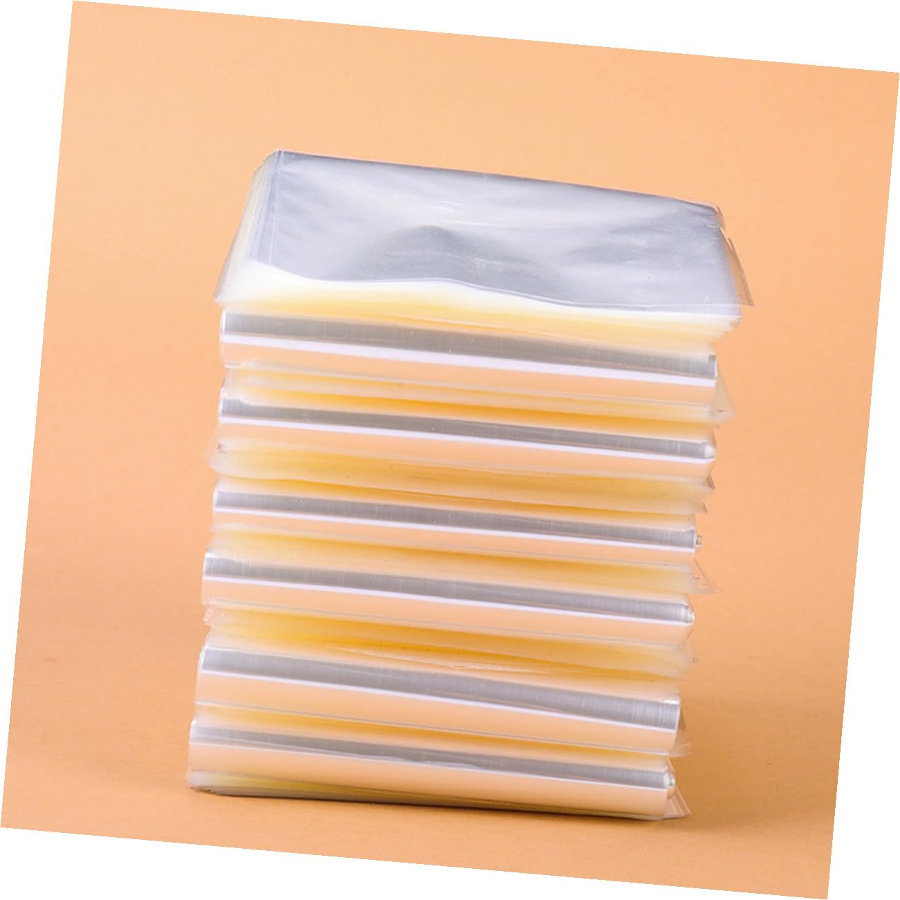 PRETYZOOM 100pcs PVC Heat Shrink Wrap Bags 9x25cm Curved Shrink Film for Bottle, Box, Food Sealing and Craft Packaging