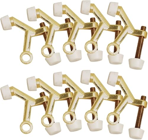 Design House - Topes de puerta con resorte, puntas de goma acolchada, aleación de zinc resistente, fácil instalación, latón pulido, paquete de 10,