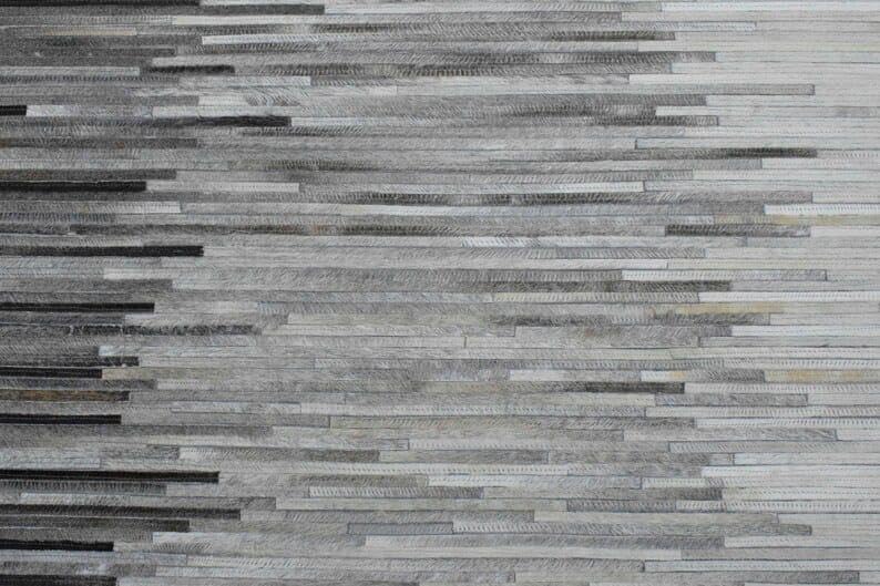 Miniatura 2 de Alfombra antideslizante de piel de vaca tejida a mano con parches de ladrillos para dormitorio, sala de estar  Alfombra impresa colgante en la