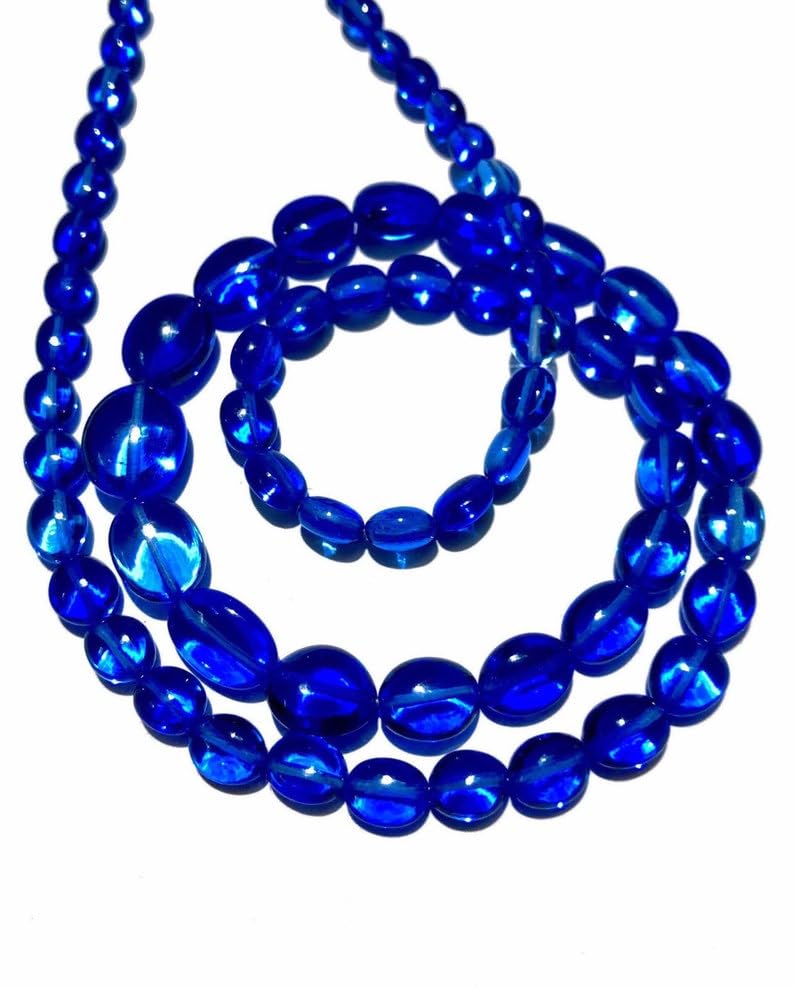 Spinelle bleu suisse naturel : perles ovales de 5-9 mm pour créer vos colliers d'été