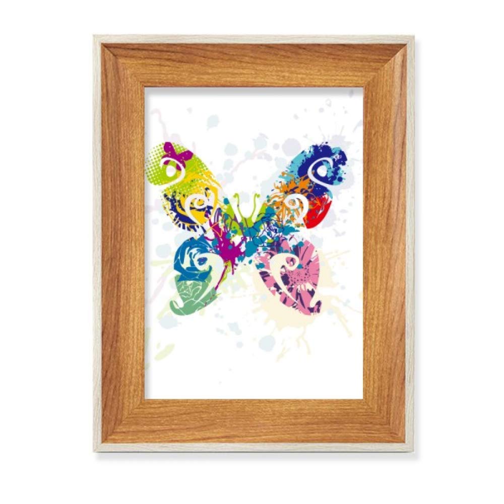 Cadre photo bois papillon fleurs graffiti illumine un bureau sombre et terne