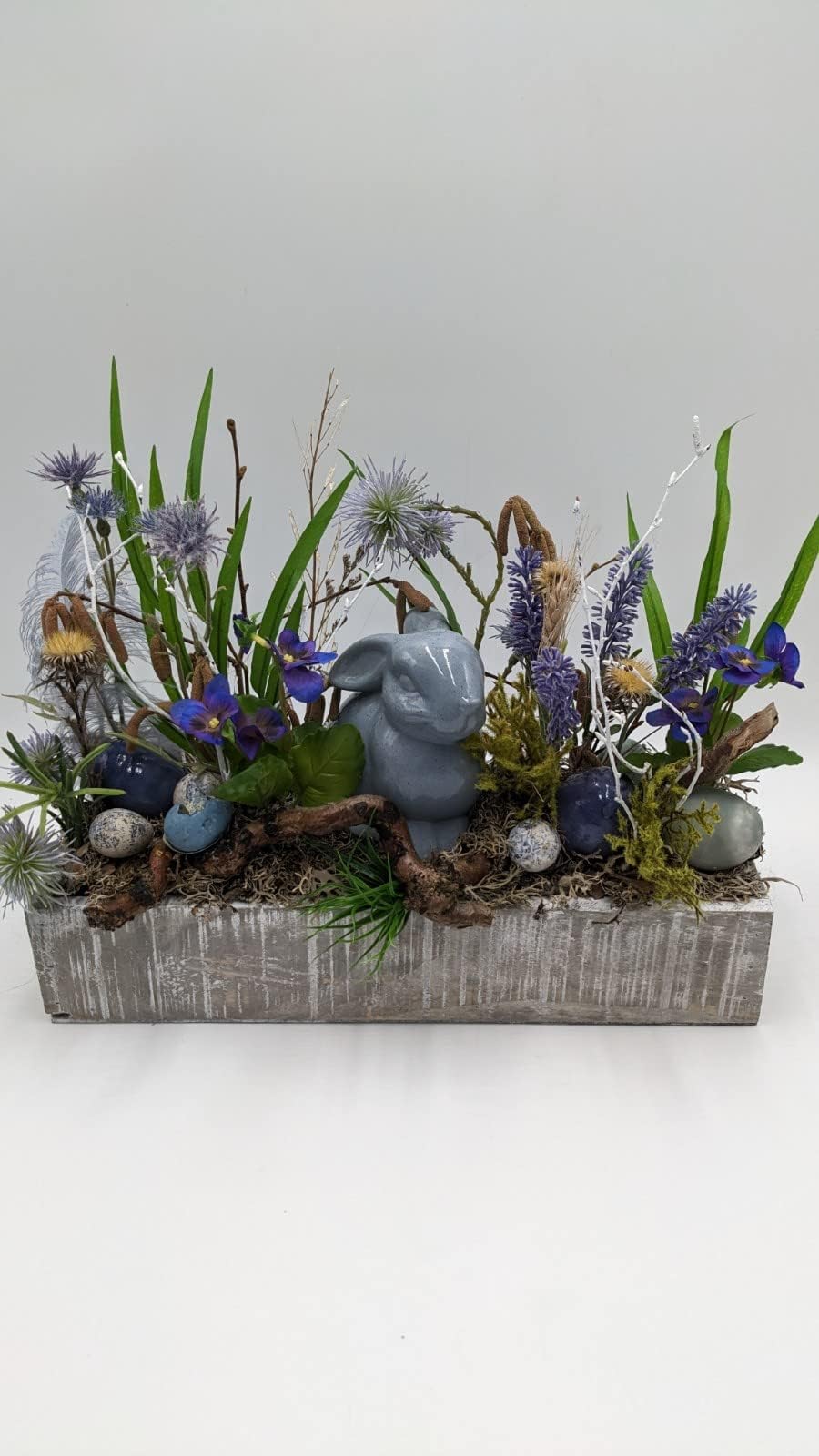 Ostergesteck Frühlingsgesteck Hase Lavendel Eier Distel blau grün