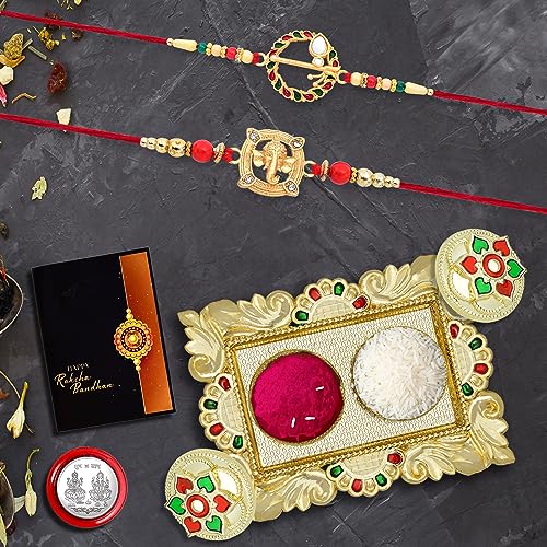 Image of Periapt Rakhi Combo (K2 560+908 AA1) with Pooja Coin, Gold Color Pooja Thali / Tilak Set & Greeting Card, rakhi thali | rakhi for brother and bhabhi | Rakhi with plate | Rakhi for kids | rakhi for brother and bhabhi | handmade rakh | rakhi for brother kids | rakhi Set of 2