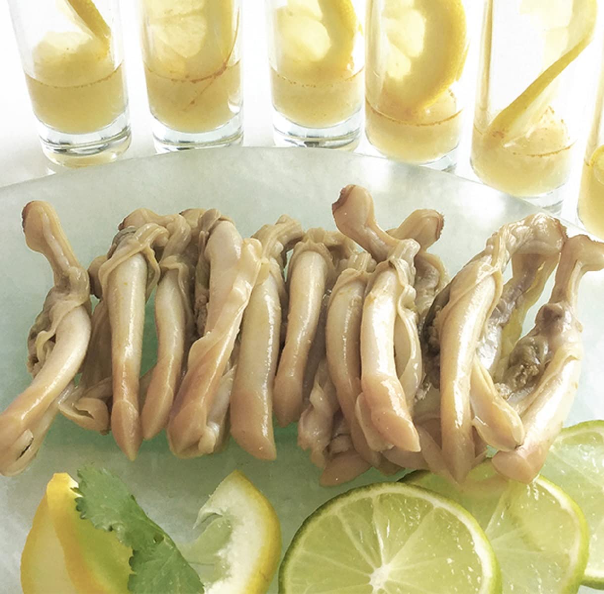 Navajas al natural. Peso Neto 111 gramos. Peso Escurrido 63 gramos. Categoría Gourmet. Con ingredientes 100% Naturales: Navajas, Agua y Sal. Alfonso Torres.