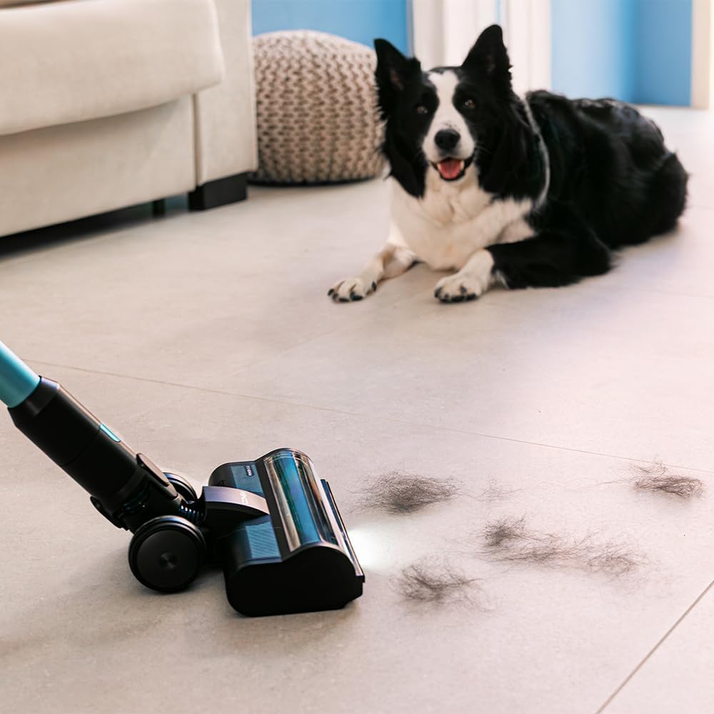 Woman vacuuming a hard floor with the Cecotec Conga Rockstar 3500 Storm Pet Flex