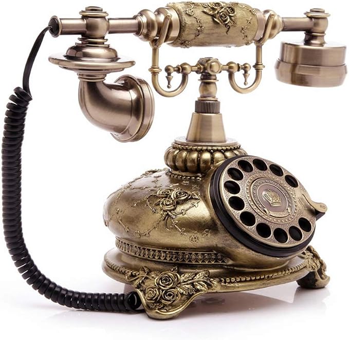 Teléfono vintage retro con disco giratorio y cable miniatura 3