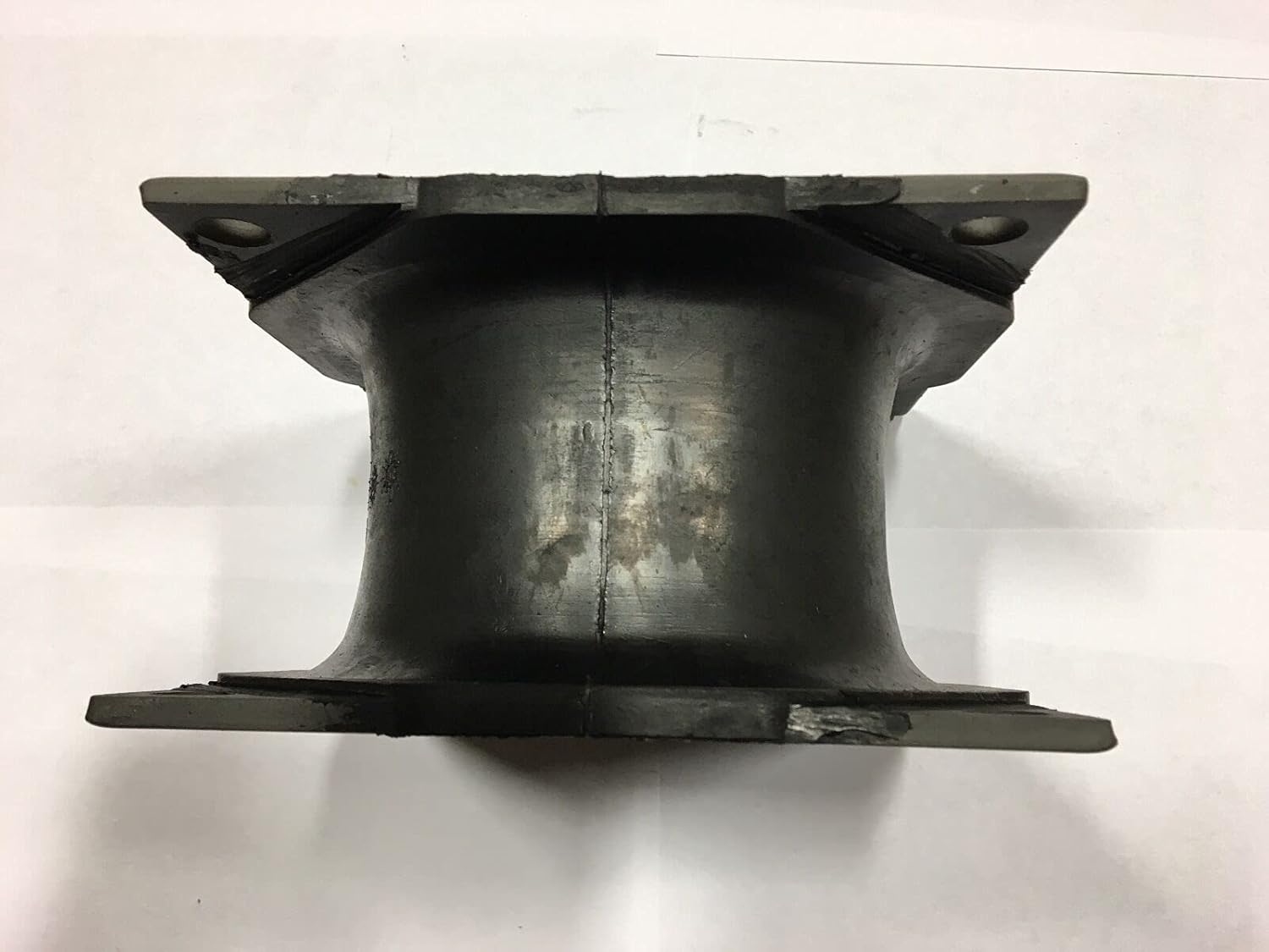 Another side view of the HDI rubber isolator shock mount, showing the profile and thickness of the rubber.