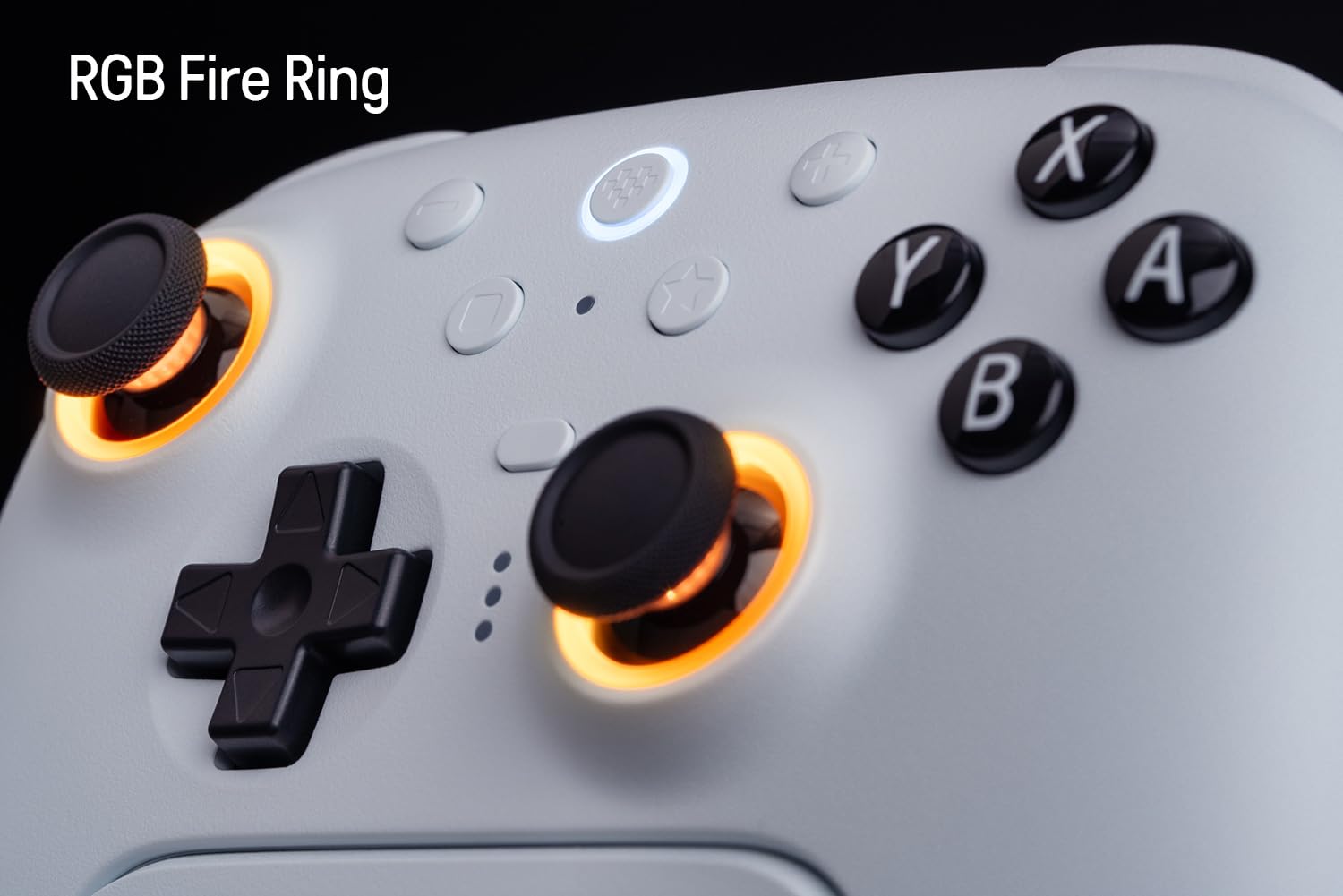 Жогорудан төмөн view of the 8Bitdo Ultimate 2 controller showing the RGB illuminated rings around the joysticks.