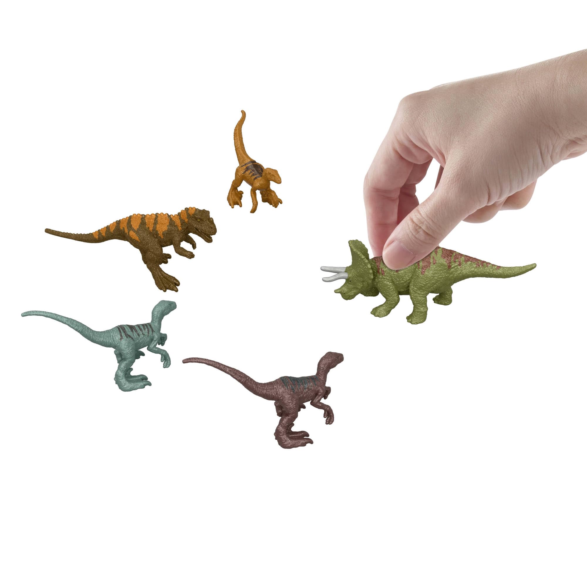 Mattel Jurassic World Calendario de Adviento, 24 días, 19 minis | Tema visita a la isla de Jurassic Park; sorpresas: dinosaurios, figura humana y accesorios, JLD23