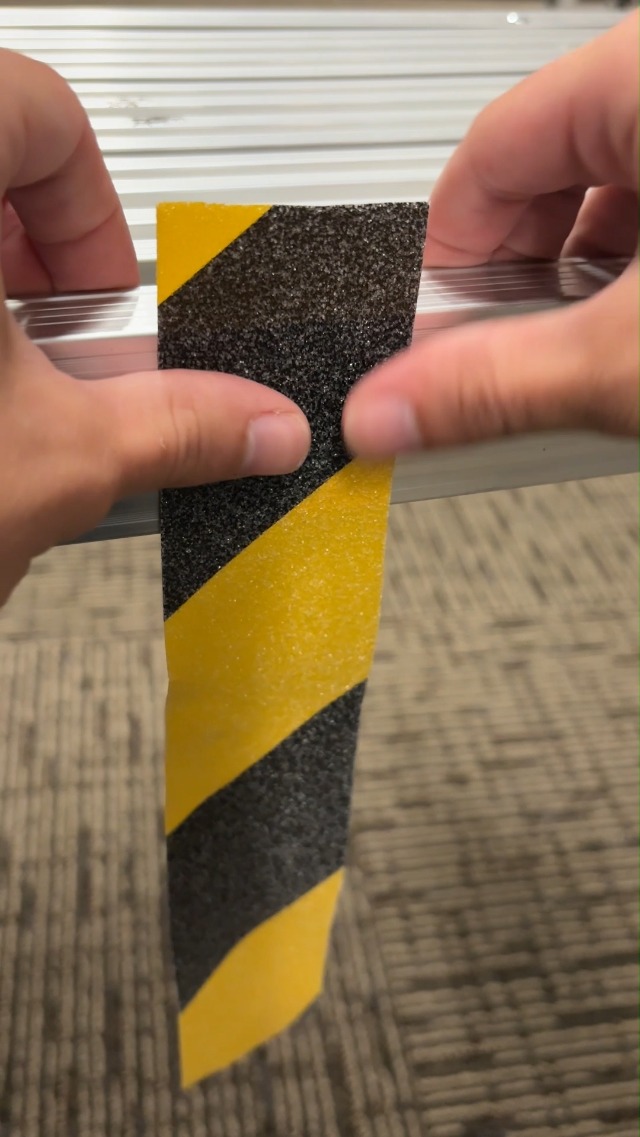 Image of Performance Tool W514 2 in. x 16 ft. Black /Yellow Grip Tape - Heavy Duty Anti-Slip Tape for Stairs, Safety, Traction, and More