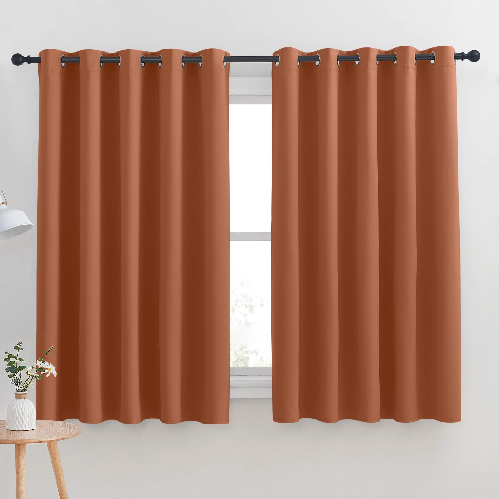NICETOWN Thermal Insulated Burnt Orange Blackout Curtains for Bedroom, Window Treatment Solid Grommet Room Darkening Drape Panels for Bedroom (Set of 2, 70 by 63 inches Long)