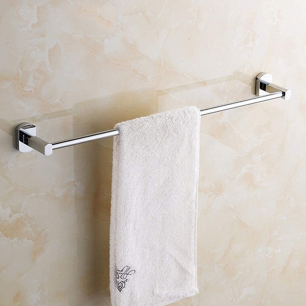 Porte-serviettes mural rond pour une salle de bain zen et ordonnée