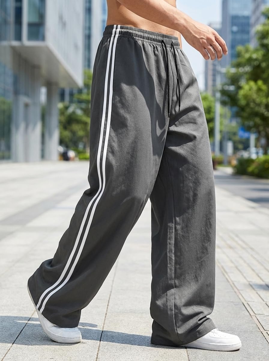 Pantalones de chándal holgados para hombre, pantalones casuales a rayas laterales, ropa de calle con bolsillos