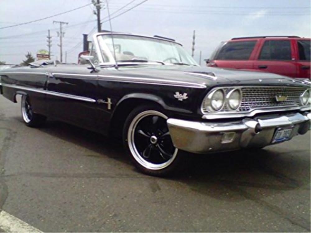 American Racing Torq Thrust M Gloss Black Wheel with Machined Lip (17x7"/5x4.5")