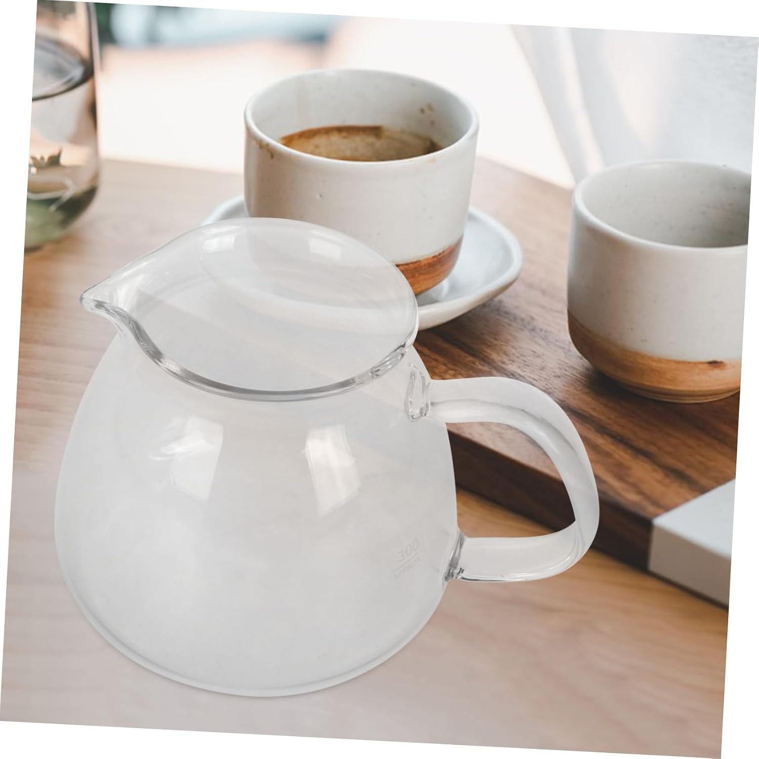 Glass Serving Pitcher for Tea and Coffee Clear Beverage Jug with Handle Elegant Design for Cold Brew and Family Sharing for Home Use