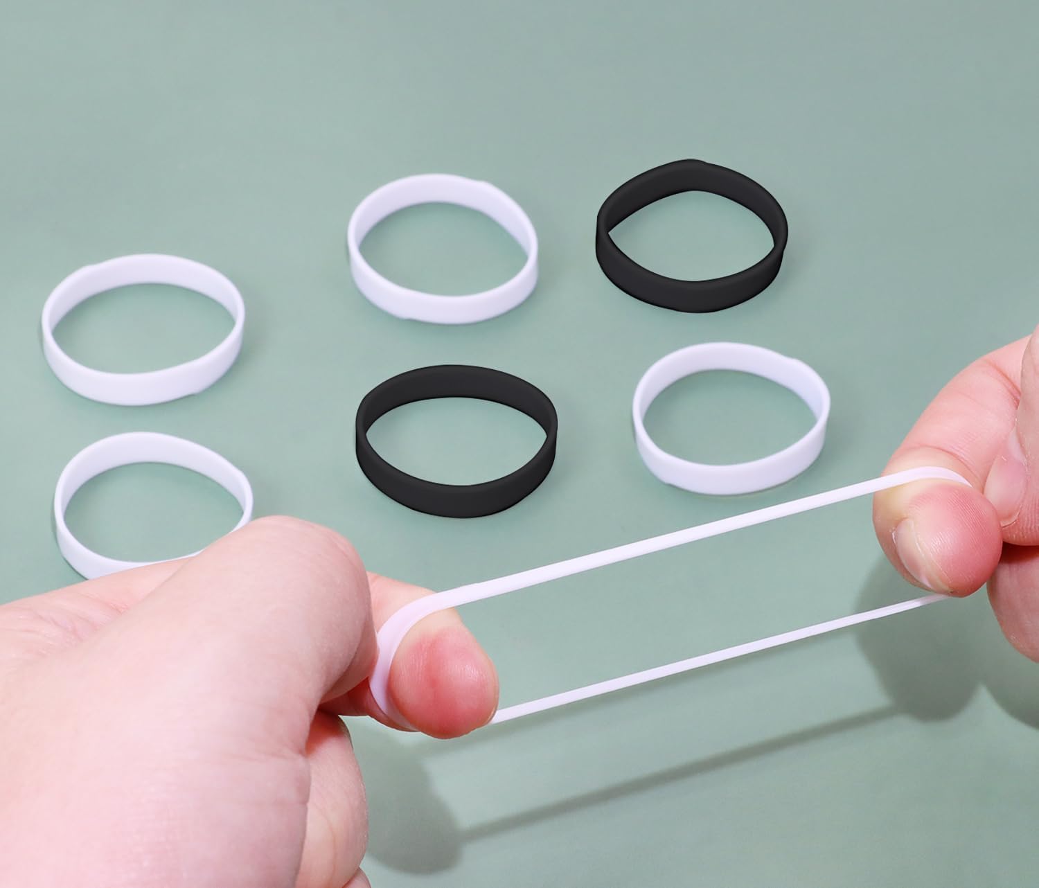 ONLYKXY 200Pcs Black & White Mini Silicone Cable Ties Soft Flat Thick Rubber Bands Elastic Band Supplies Reusable Elasticity Coil Ring for School Home Office Banding Packing Storage Mark (25mm/1in) image 3