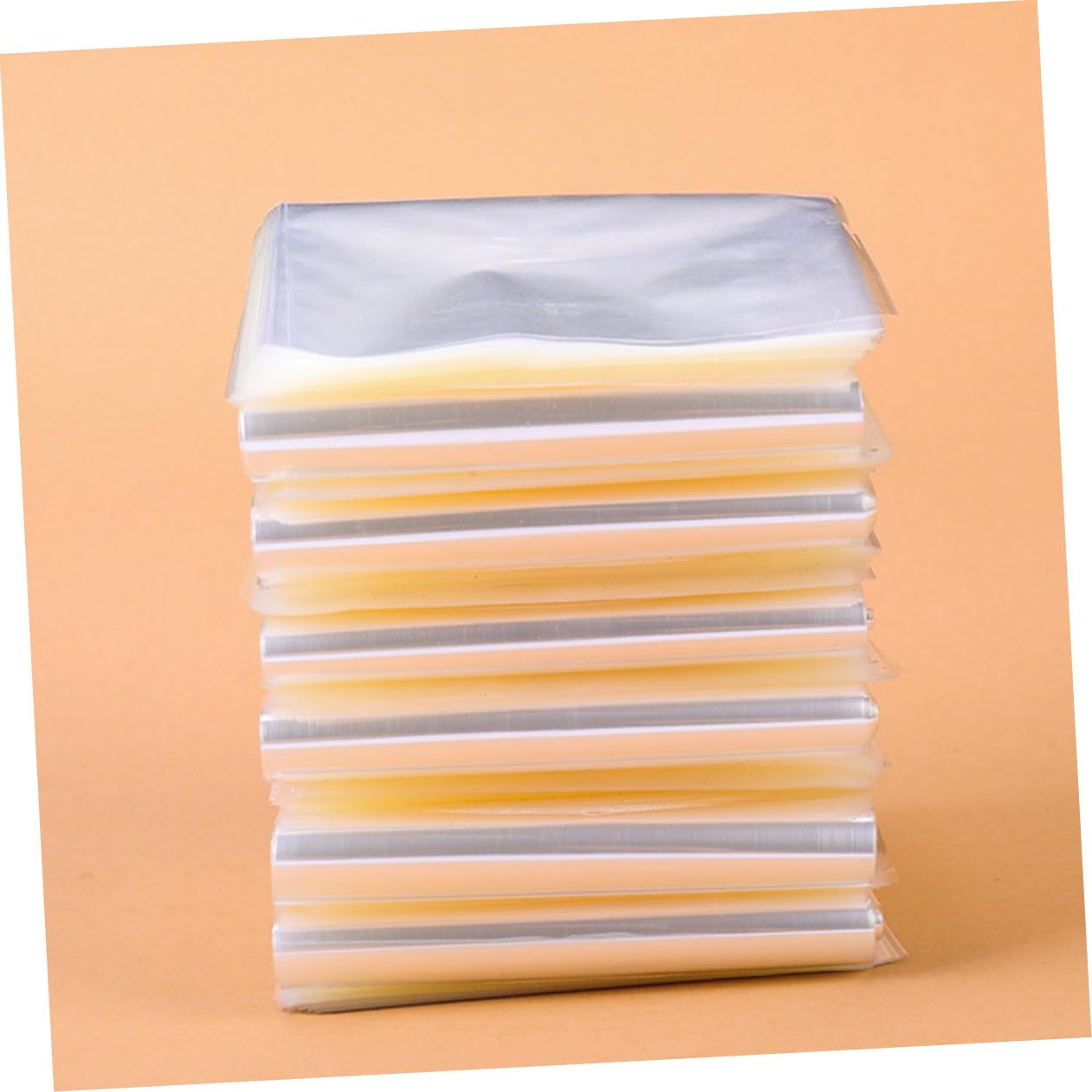 100pcs PVC Heat Shrink Bags 9x25cm Curved Heat Shrink Wrap Film for Bottle, Box, Food Sealing and Craft Packaging, Industrial Film for Food Wrapping and Party Favors