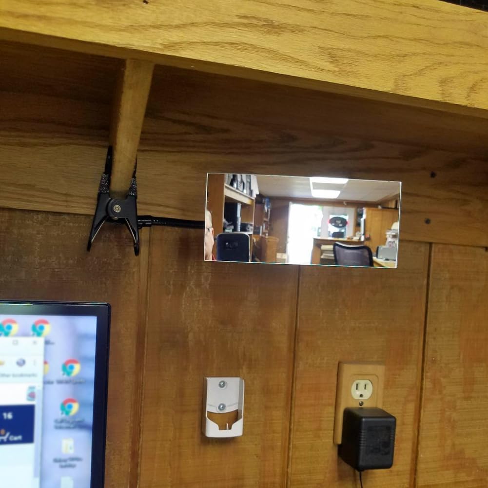 Ampper Clip On Security Mirror attached to a desk, providing a rear view.