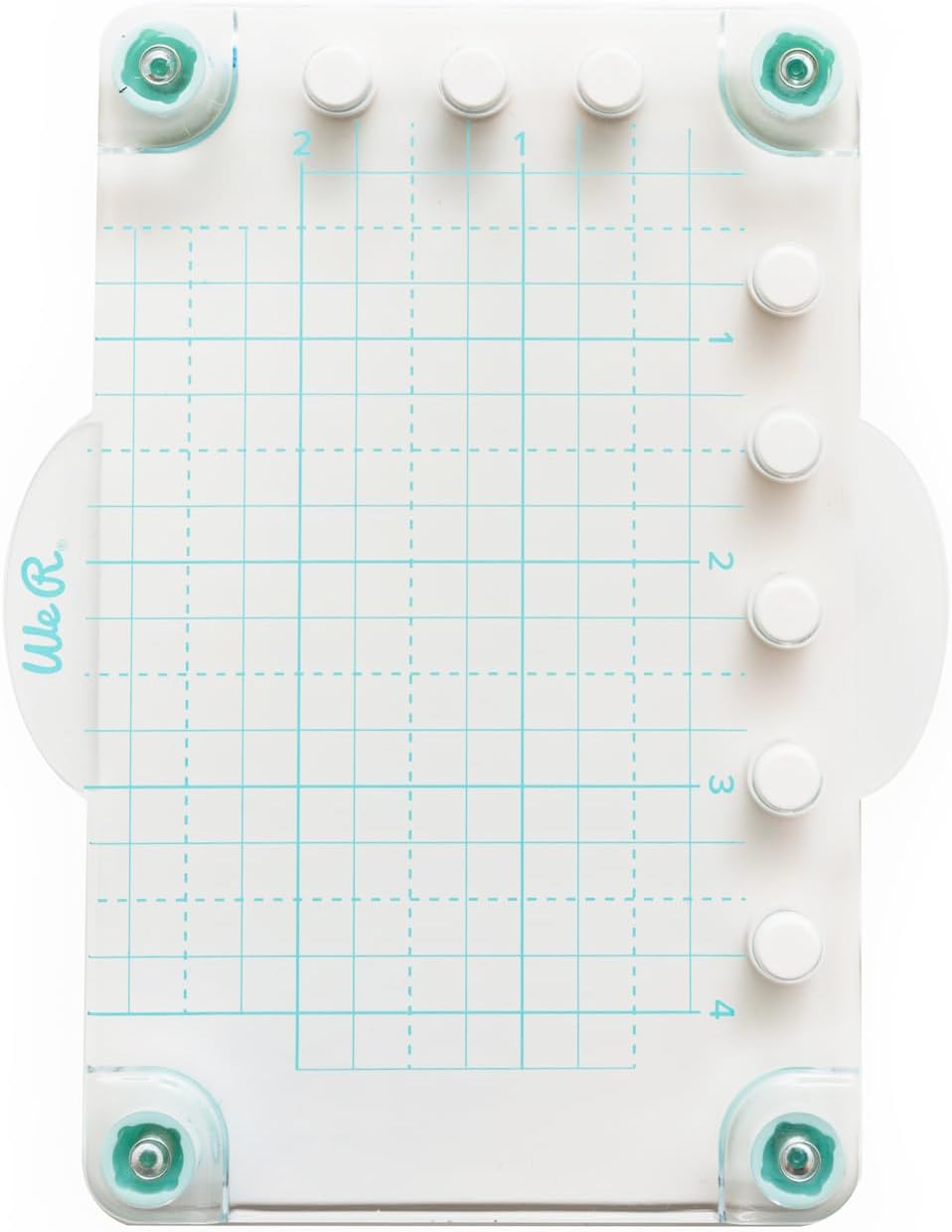 Top-down view of the We R Memory Keepers Mini Precision Press with a grid for alignment.