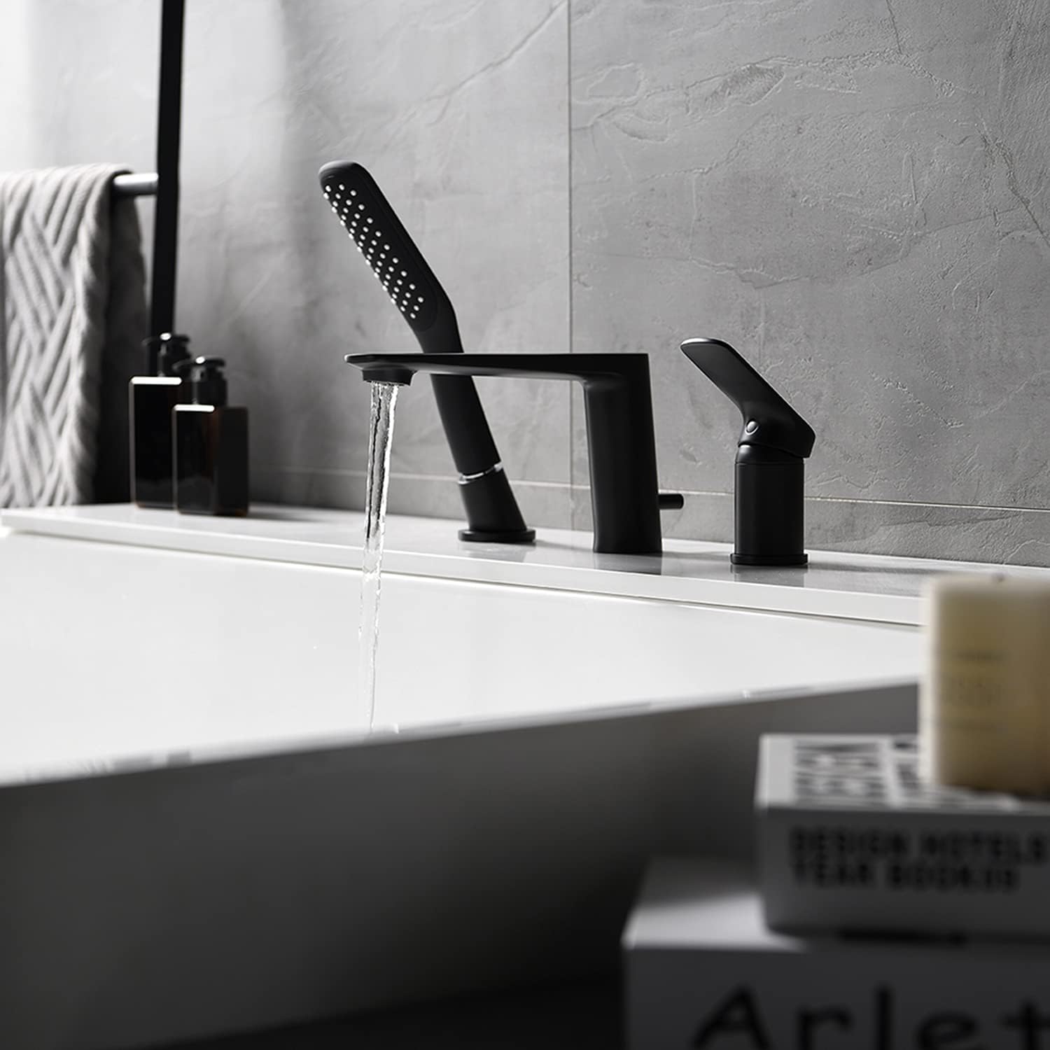 The RBROHANT Bathtub Faucet with water flowing from the main spout into a bathtub.