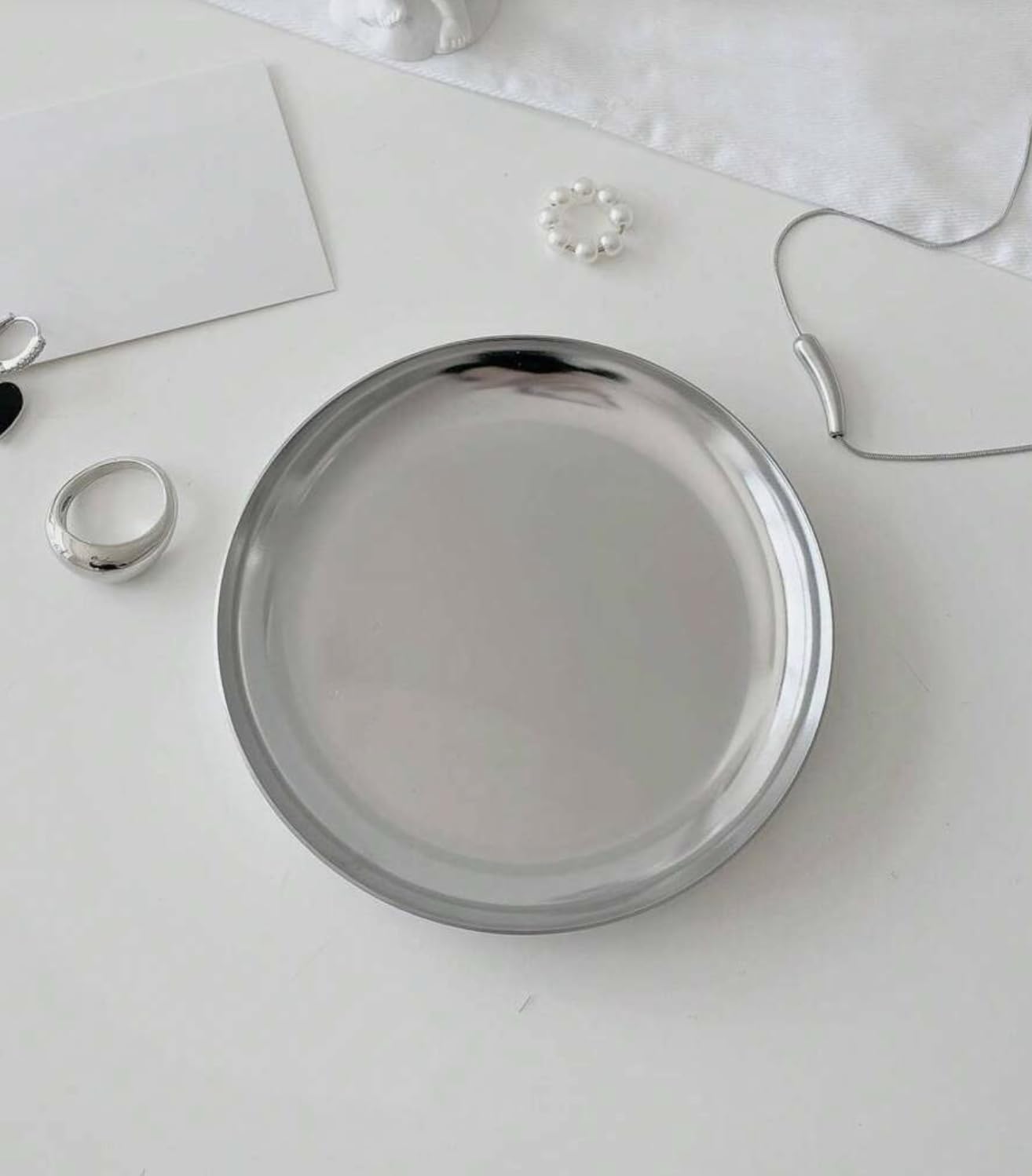 Generic Stainless steel jewelry tray. Small, metal, shiny, silver, round.