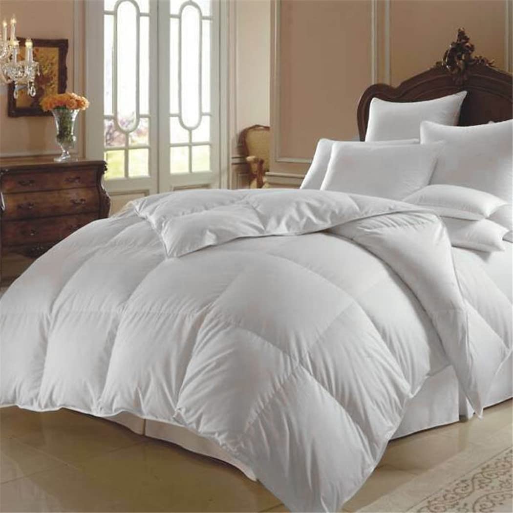 Couette en duvet d'oie blanche idéale contre le froid de l'hiver