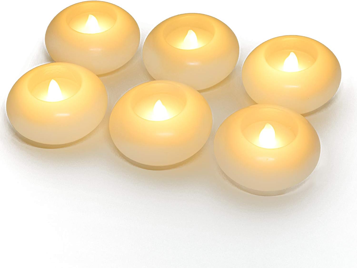 Amazon Com Homemory 3 Inch Flameless Floating Candles 150 Hour White Wax Battery Flickering Waterproof Tealights Wedding Centerpiece Engagement Christmas Beach Parties Home Decor Set Of 6 Home Kitchen