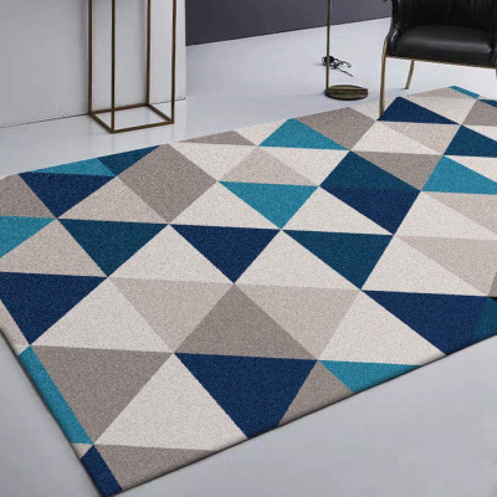 Tapis de salon géométrique bleu pour créer un coin cosy et moderne