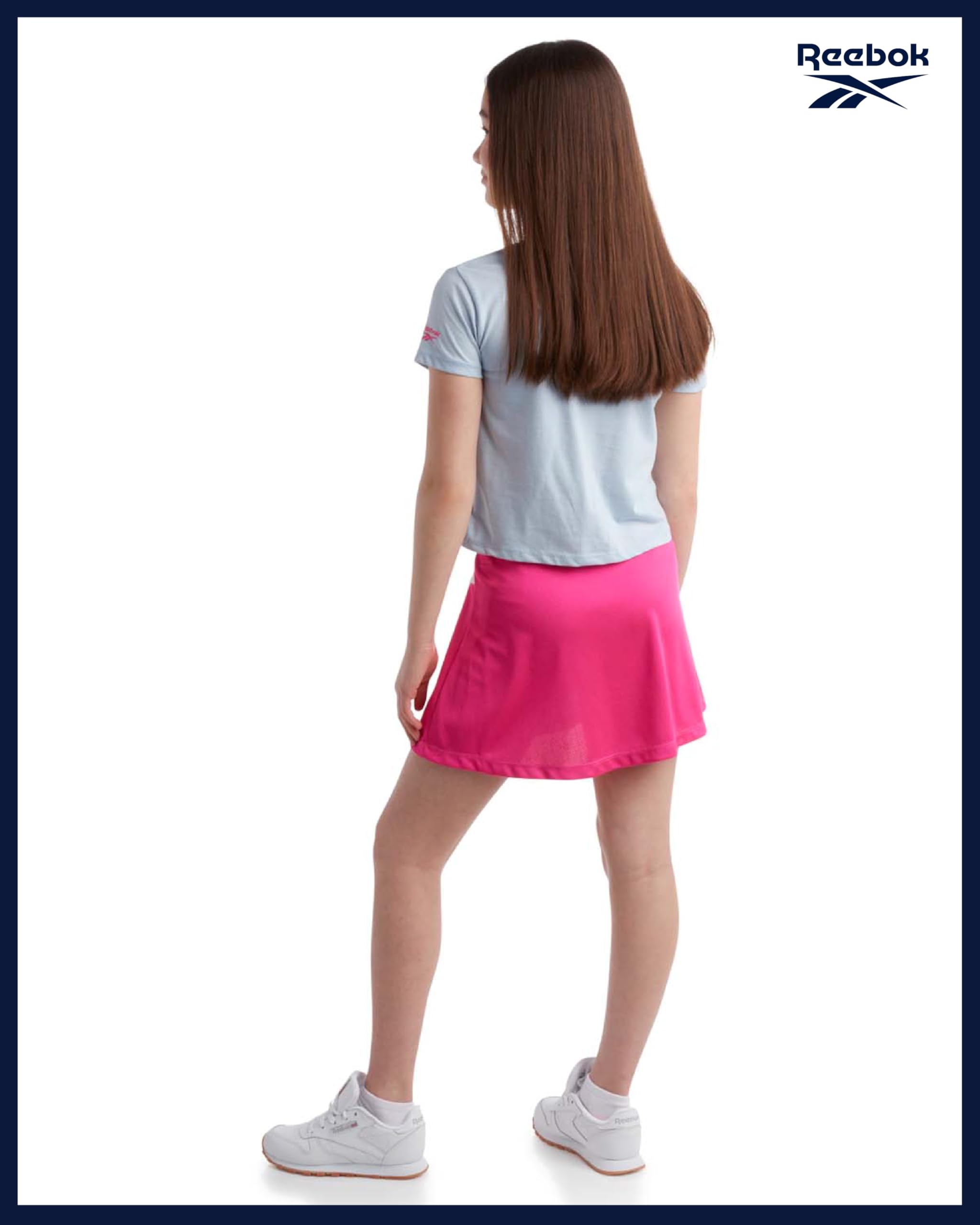 Reebok Conjunto de falda deportiva para niña, 2 piezas, camiseta manga corta, falda de tenis, tallas 7-12