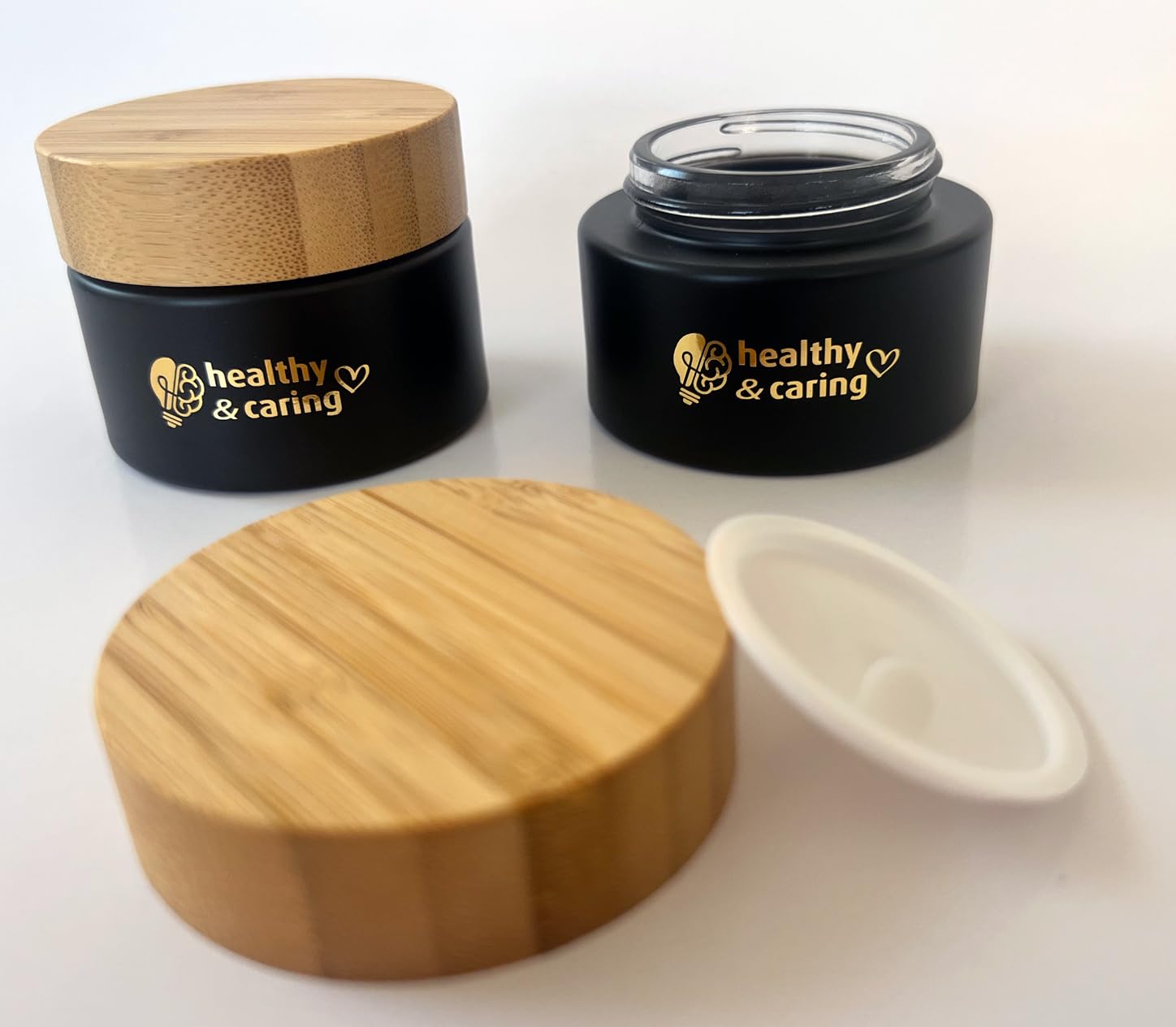 healthy & caring Black Glass Cosmetic Container (50 ml) with Bamboo Lid and Golden Emblem (2 Jars) - Image 2