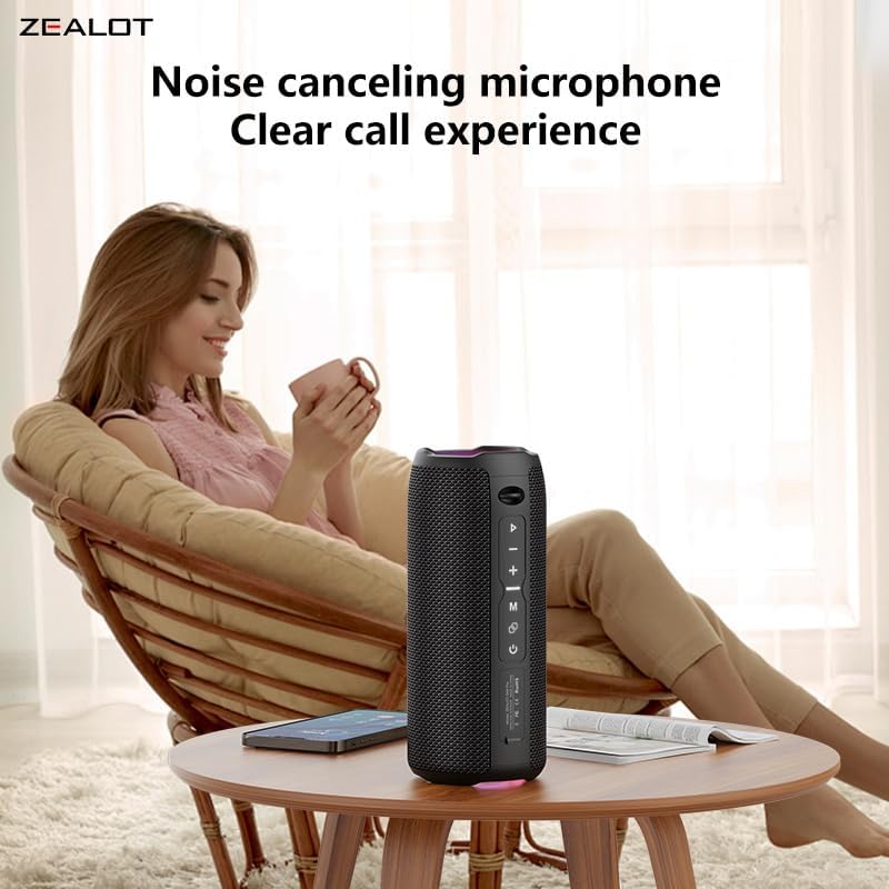 A person relaxing with the ZEALOT S49 Pro speaker nearby, highlighting its noise-canceling microphone for clear calls.