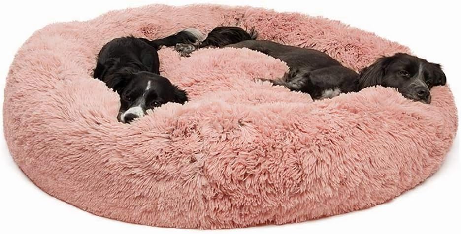 pink fluffy dog bed