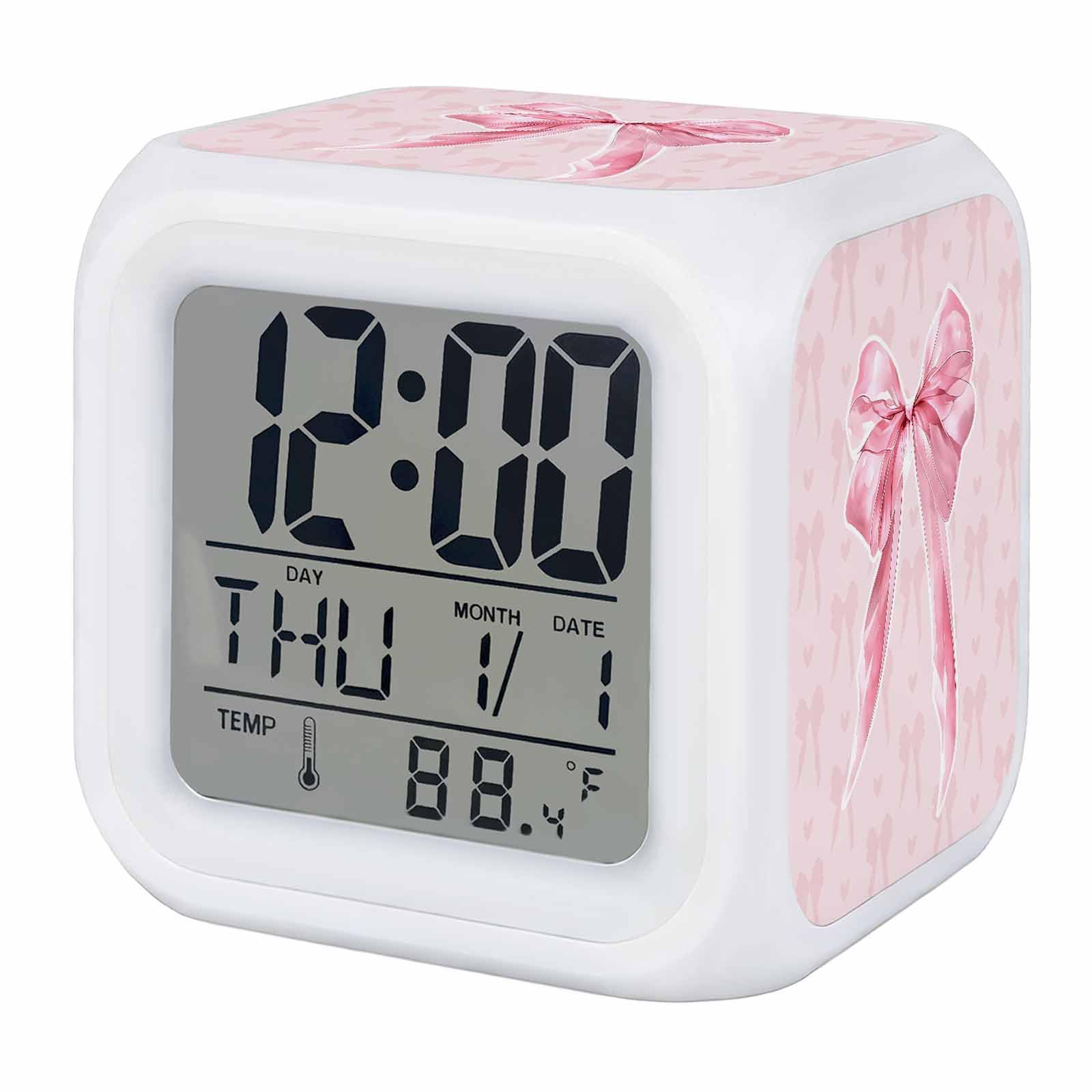 Reloj despertador de lazo rosa con termómetro integrado para controlar el clima al dormir